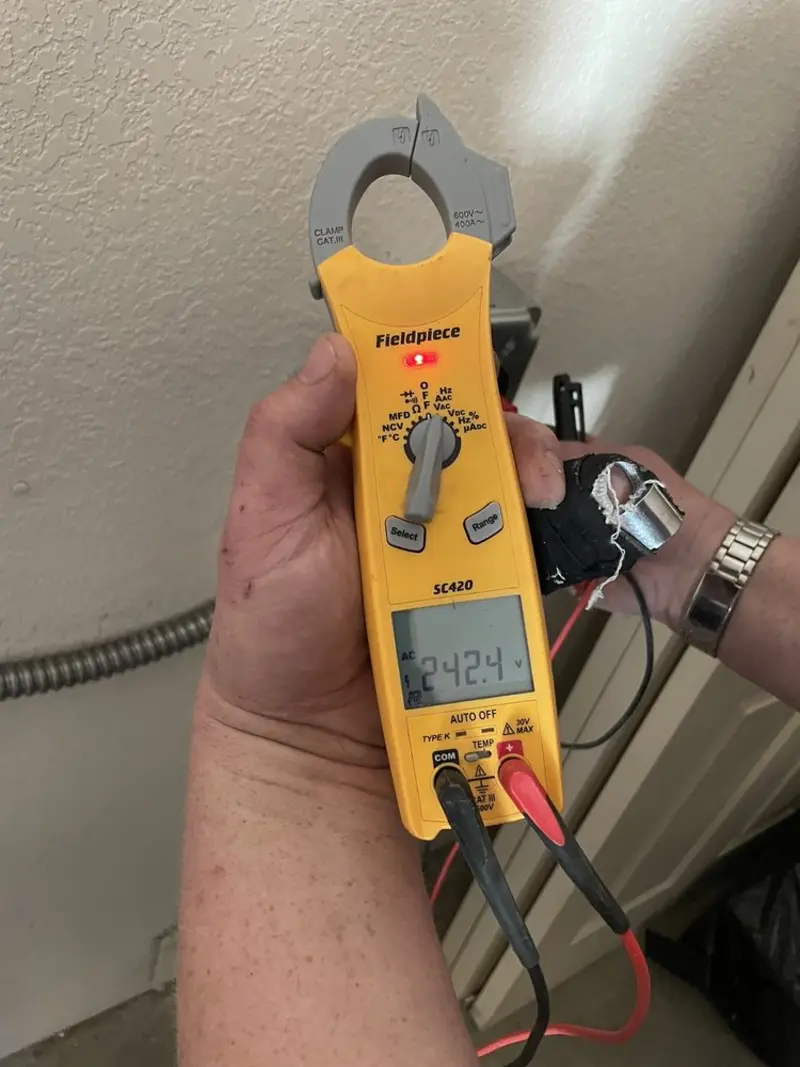 Voltage testing with clamp meter during Ceiling Fan Installation in Mount Shasta